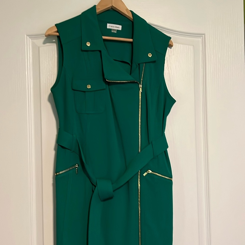 Beautiful Calvin Klein sleeveless dress. Size 14. Never worn but tags missing.